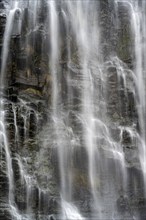 Water flowing down rocks, detail of a waterfall, Lisbon Falls, long exposure, near Graskop,