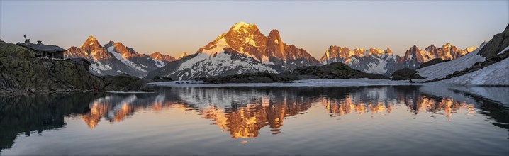 Evening mood, mountain landscape at sunset, alpenglow, water reflection in Lac Blanc with mountain