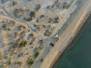 Top-Down, Camping with car, Aerial view, Landscape at Lake Issyk Kul, Kyrgyzstan, Asia