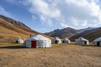 Yurts with yellow hills, Atbashy district in the Naryn region, Kyrgyzstan, Asia