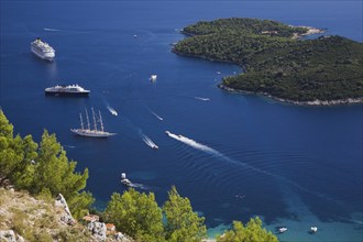 High angle view of cruise ships and sailboats on the Adriatic sea taken from Mount Srd, Dubrovnik,