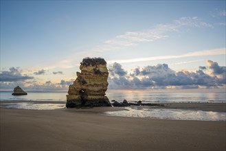 Colourful cliffs and sunrise on the beach, Praia da Dona Ana, Lagos, Algarve, Portugal, Europe