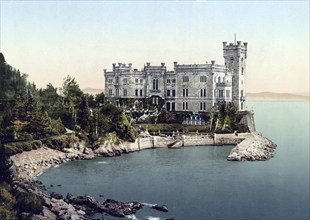 Miramare Castle, Castello di Miramare, on a rocky cliff in the bay of Grignano on the Adriatic Sea