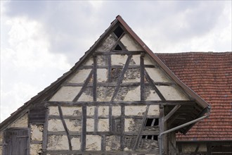 Old historic half-timbered house, gable, façade, in need of renovation, Swabian Alb,