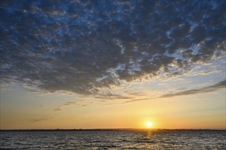 Lake Dümmer at sunset with evening clouds, Hüde, Lower Saxony, Germany, Europe