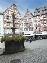 The historic Bernkastel market square with St Michael's Fountain, Bernkastel-Kues, Moselle,