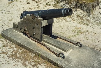 Old cannon at Sandhammaren lighthouse that gave sound signal in fog, Ystad municipality, Skåne,