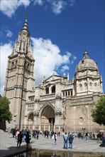 Large Gothic cathedral with towers and stone building, people and blue sky, Cathedral, Cathedral of