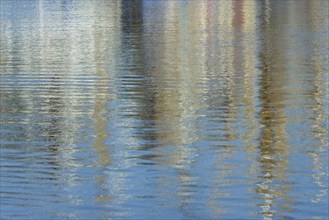 Reflection, colourful reflections on the water surface, maritime impressions, Greetsiel, North Sea,