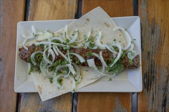 Armenian food, minced meat skewer served in an Armenian garden restaurant, Bavaria, Germany, Europe