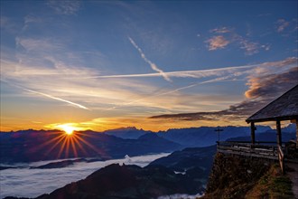 Sunrise at the Toni-Lenz-Hütte, behind Osterhorngruppe, Dachstein and Tennengebirge, in the valley