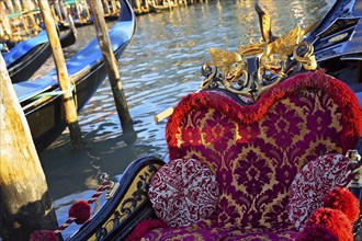 Luxury Gondola waiting for tourists near Rialto Bridge in Venice