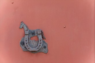 Horseshoe as a lucky charm on a metal farm gate, lucky symbol, Palatinate, Rhineland-Palatinate,