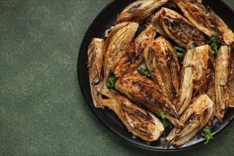 Baked, oven-baked fennel, with spices, in olive oil, homemade, no people