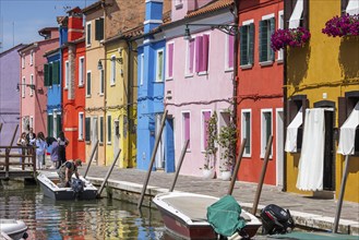 City view of Burano with colourfully painted houses and canals. Burano, Venice, Veneto, Italy,