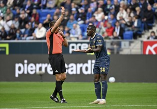 Referee Tobias Reichel shows Stanley Nsoki TSG 1899 Hoffenheim (34) red card red sending off,