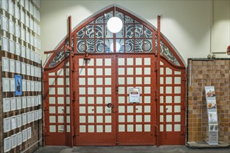 Iron-clad portal in the Art Nouveau style of the listed market hall in Stuttgart,