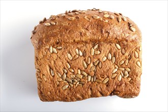 Rye bread with sunflower seeds isolated on white background. close up