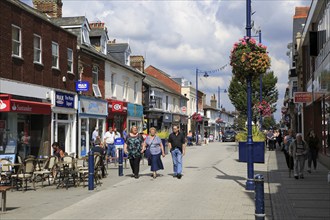 Shops and shoppers pedestrianised Hamilton Road, Felixstowe, Suffolk, England, UK