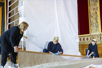 Hanging of the last tapestries in the Royal Parade Rooms in the Dresden Residenzschloss, Dresden,