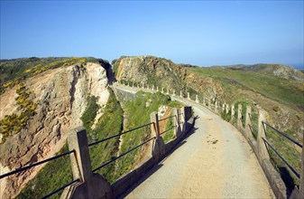 La Coupee narrow track between Little Sark and Sark, Island of Sark, Channel Islands, Great Britain