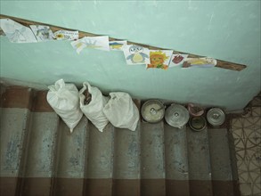 Food supplies in a former kindergarten in the frontline village of Shevchenkove, Kharkiv Oblast,