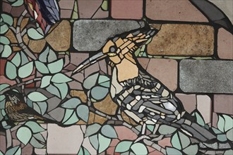 Wall mosaic with hoopoe by Isidora Paz López 2019, one, two, bird figures, sparrow, sparrow, flower