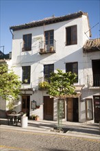 Building in historic square Placeta de San Miguel Bajo in the Albaicin district, Granada, Spain,