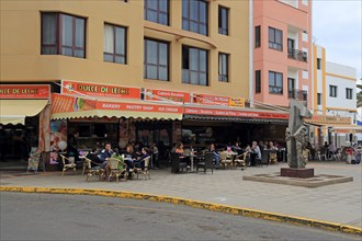 People sitting outside cafe, Gran Tarajal, Fuerteventura, Canary Islands, Spain, Europe