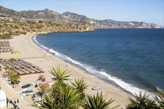 Playa Burriana sandy beach at popular holiday resort town of Nerja, Malaga province, Spain, Europe