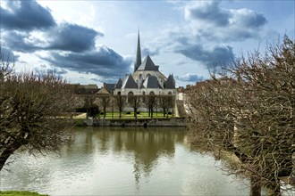 Nemours. Saint-Jean-Baptiste church on river Loing. Seine-et Marne department. Ile-de-France.