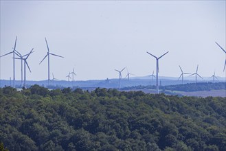 Neukirchen wind farm near Eisenach. with distant view of Wartburg Castle, Nazza, Thuringia,