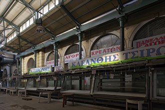 Closed Athens Central Market, historic meat market hall, aisle with empty showcases, Athens,