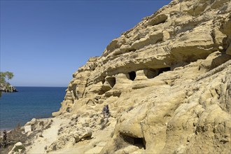 Partial view of former Roman necropolis with cave dwelling tombs carved in sandstone Grottoes in