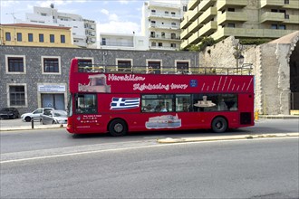 Red double decker bus with open air seats open air for city tour sightseeing tour sightseeing tour