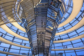 Visitors in the spiral-shaped Reichstag dome, Berlin, 21 May 2014