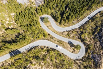 Aerial view of mountain road fv 44 west of Flekkefjord, camper van, norwegian southern coast,