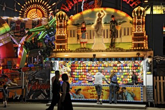 Illuminated shooting gallery, shooting gallery with balloons at night, Oktoberfest, Wies'n, Wiesn,