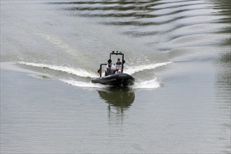 Police operation on a rubber dinghy on the Neckar, Stuttgart, Baden-Württemberg, Germany, Europe