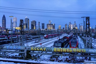 Railway tracks in front of the main railway station in Frankfurt am Main, skyline of skyscrapers in