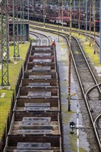 Goods train with steel slabs at the Mülheim-Styrum marshalling yard, on the railway line between