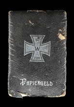 1914 German WW1 Papiergeld folding wallet for banknotes during World War One, close-up on black