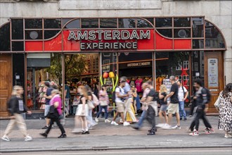 Souvenir shop on Damrak shopping street, many tourists, visitors, Amsterdam, Netherlands