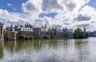 The historic Binnenhof, seat of the Dutch government, Hofvijver pond, skyline of the city centre at