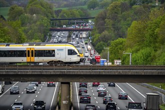 Eurobahn, regional train crossing the motorway A3, traffic on 8 lanes, incl. the temporarily