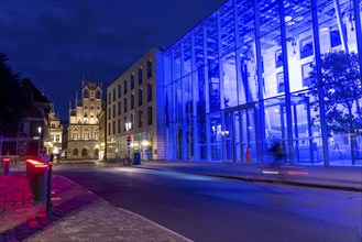 Historic old town, facade of the historic town hall, blue illuminated building of the Münster