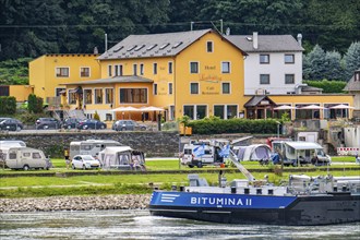 Cargo ship, tanker, on the Rhine in the Upper Middle Rhine Valley, near the Loreley Rock, campsite