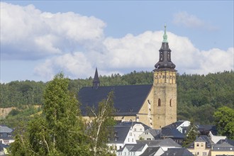 Schneeberg is a town in the Erzgebirge district of Saxony. High above the town, the town church of