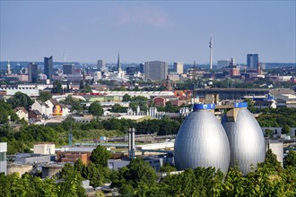 View of Dortmund city centre from the Deusenberg spoil tip, with the digestion towers of the Deusen