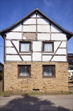 Half-timbered house on a sandstone plinth in the district of Pesch, Nettersheim, Eifel, Euskirchen